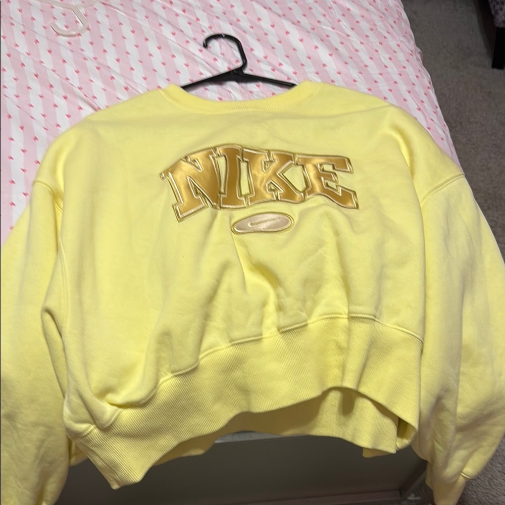 Yellow woman’s Nike sweatshirt
